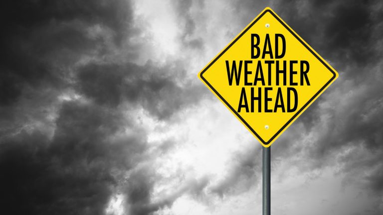 Image of storm with road sign